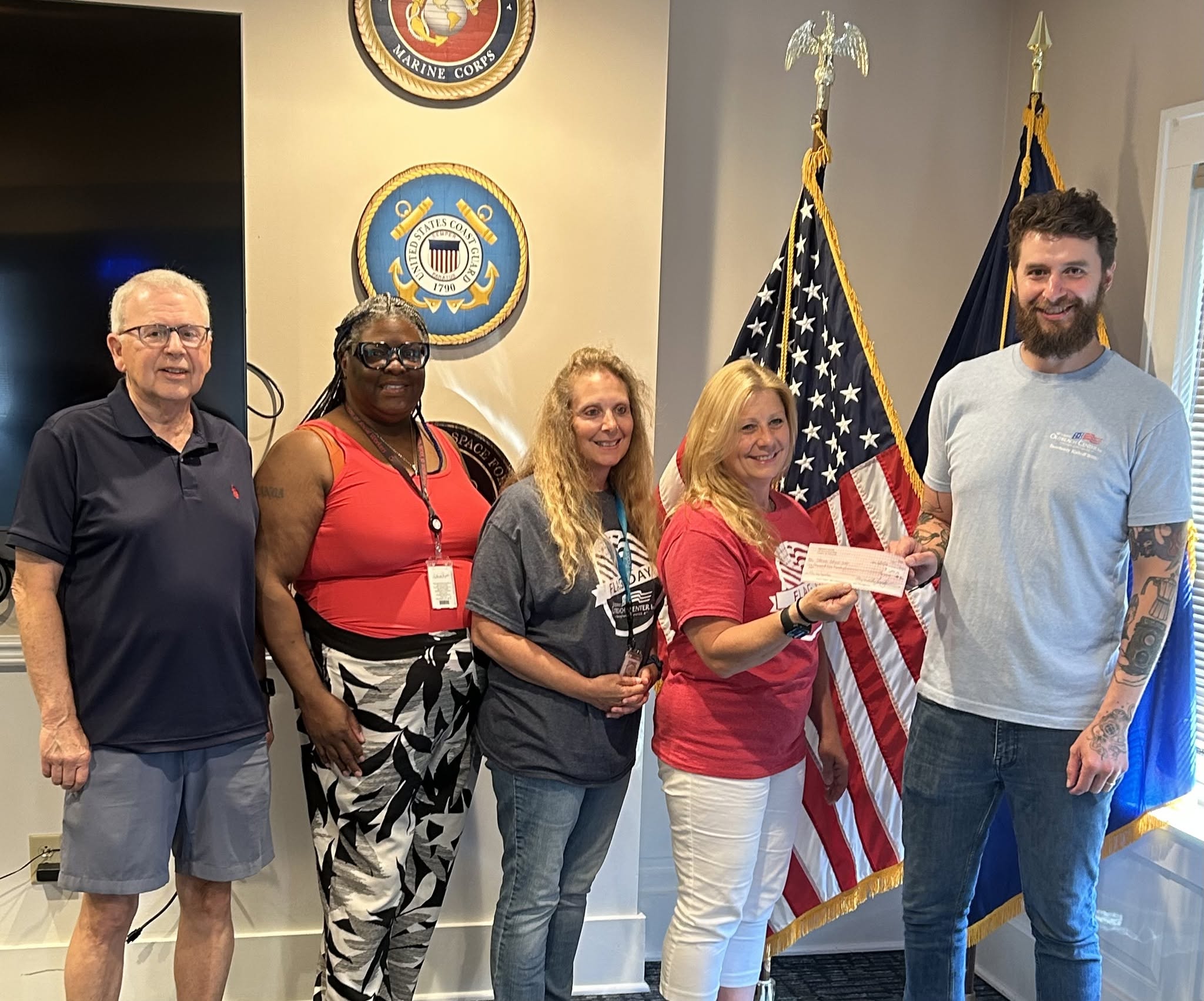 FSW presents check to Veterans Outreach Center